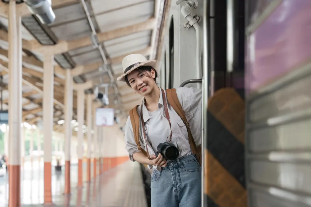portrait attraction asian woman boarding a train a 2025 01 10 07 10 06 utc