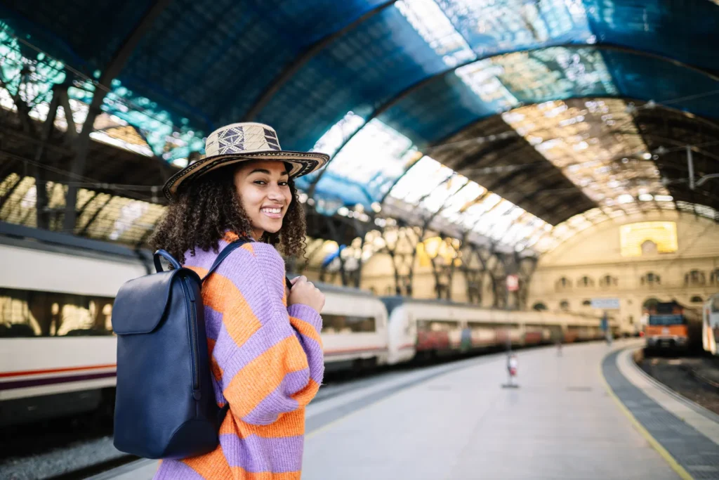 young black woman traveler with backpack and hat a 2025 01 08 09 03 16 utc 1